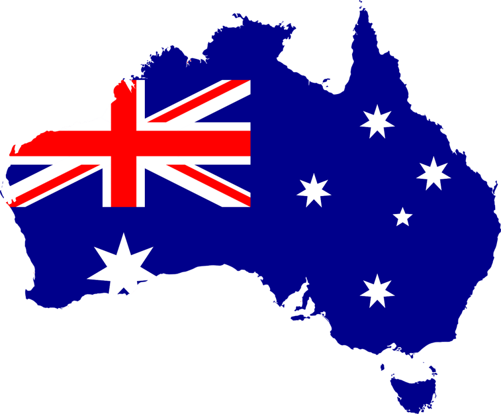 Australia map outline image with australian flag superimposed onto it
